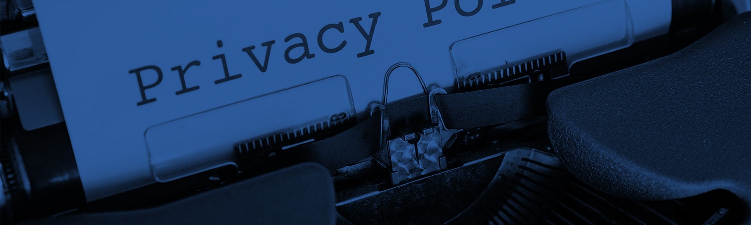 A paper with Privacy Policy printed on it.